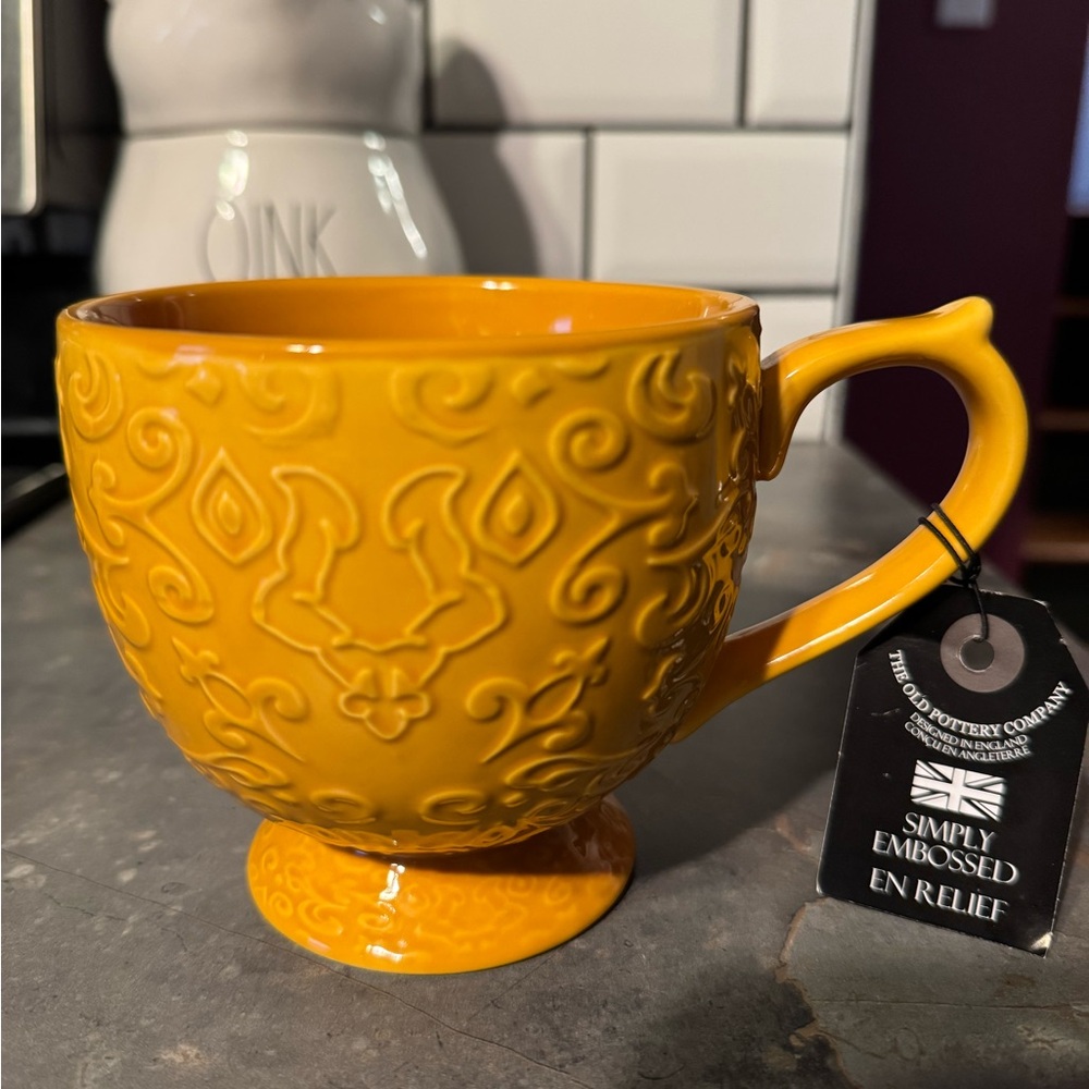The Old Pottery Company Yellow Embossed Mug